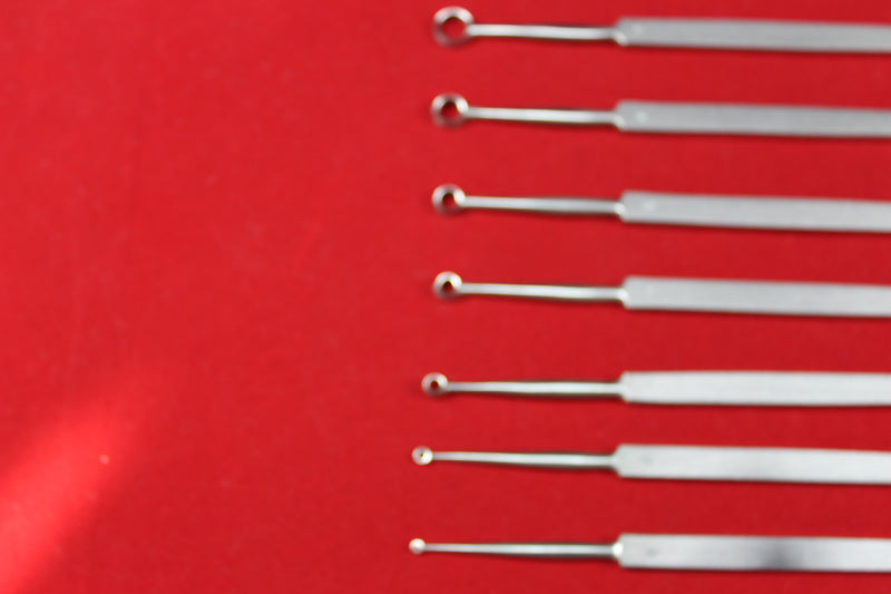 Buck Ear Curette Set of 7 Piece Sharp Point Flate handle overall length 6.5"